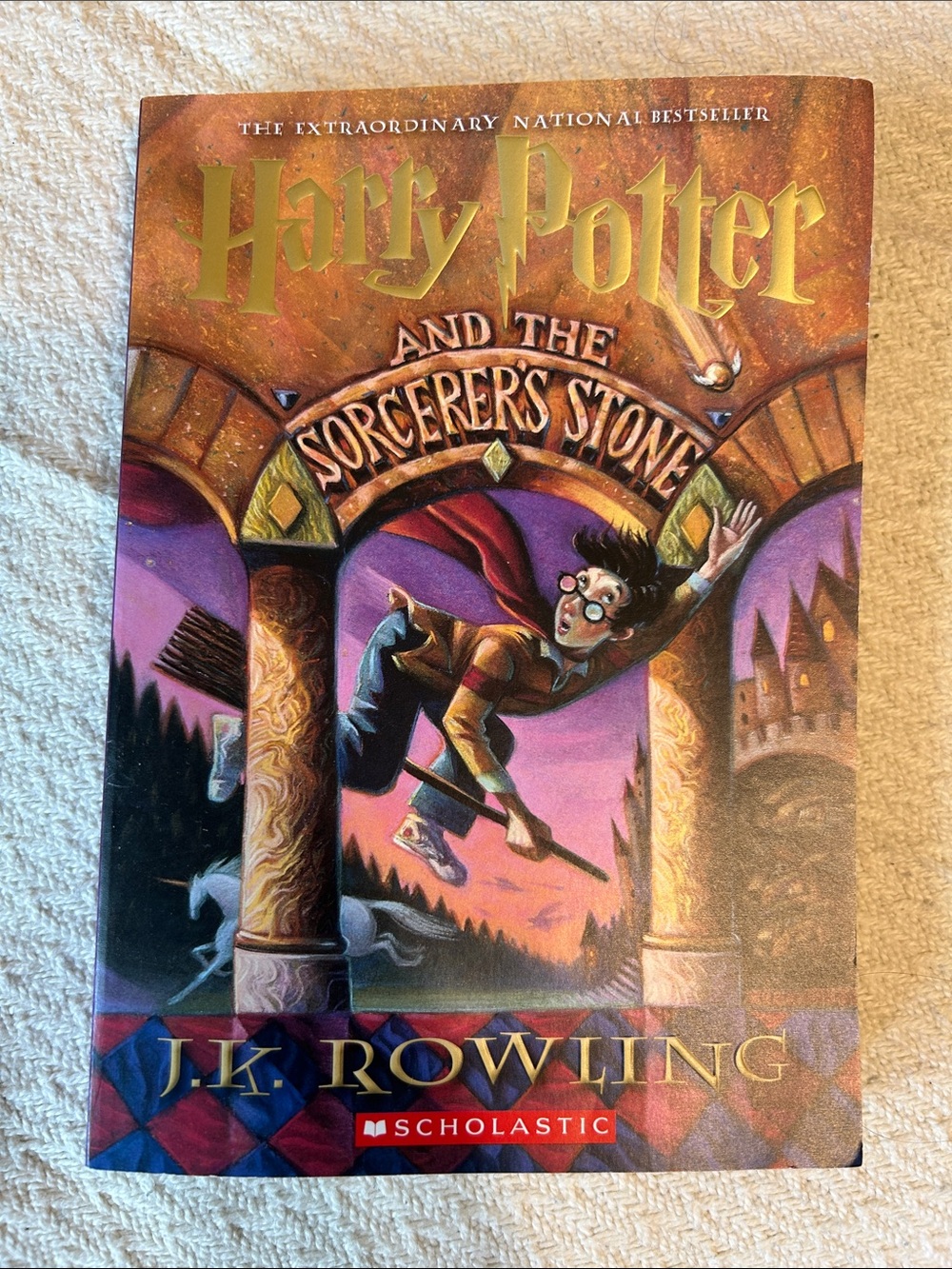 Harry Potter and the Sorcerer's Stone by J.K. Rowling - Gold & Purple Cover